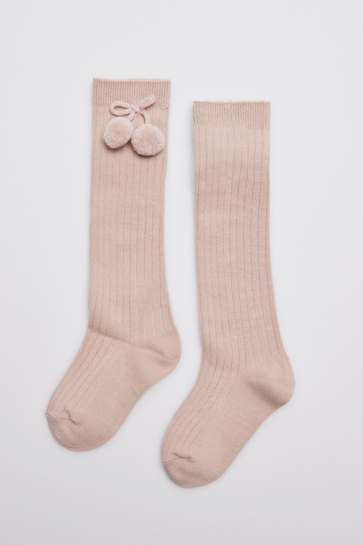 Calcetín infantil largo detalle pompones beige
