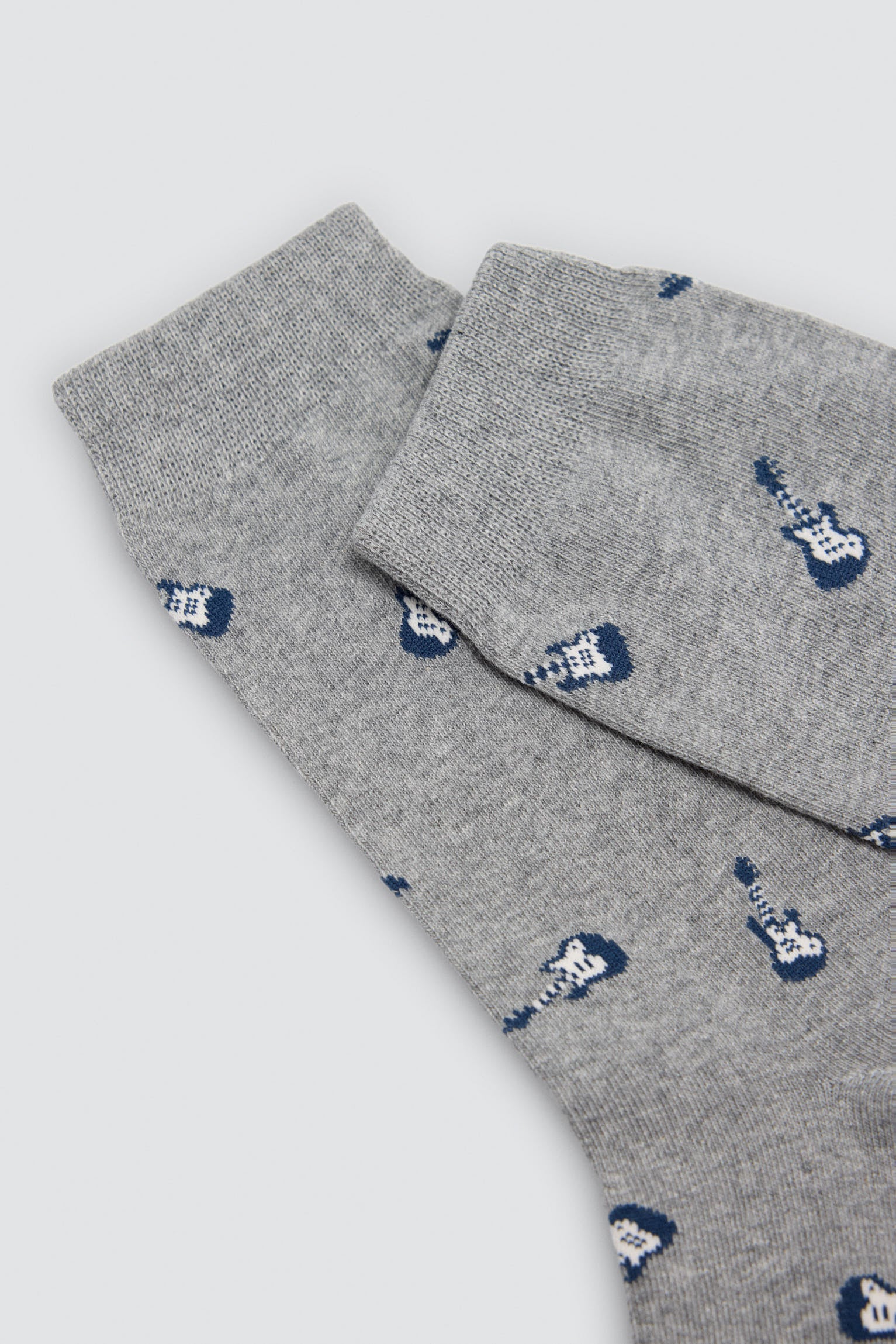 Pack 4 calcetines estampados animales, guitarras y cohetes
