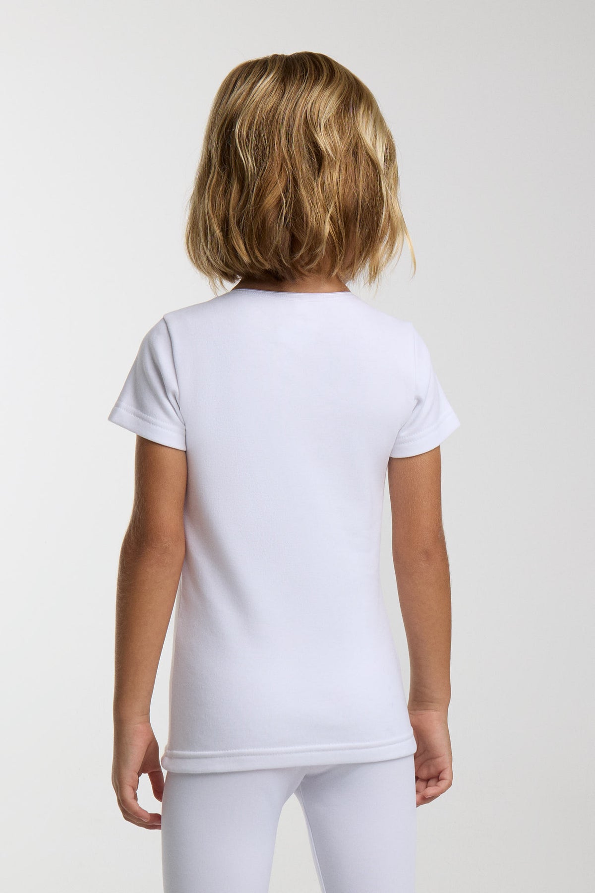 TÉRMICO LIGERO Camiseta infantil manga corta cuello pico blanco