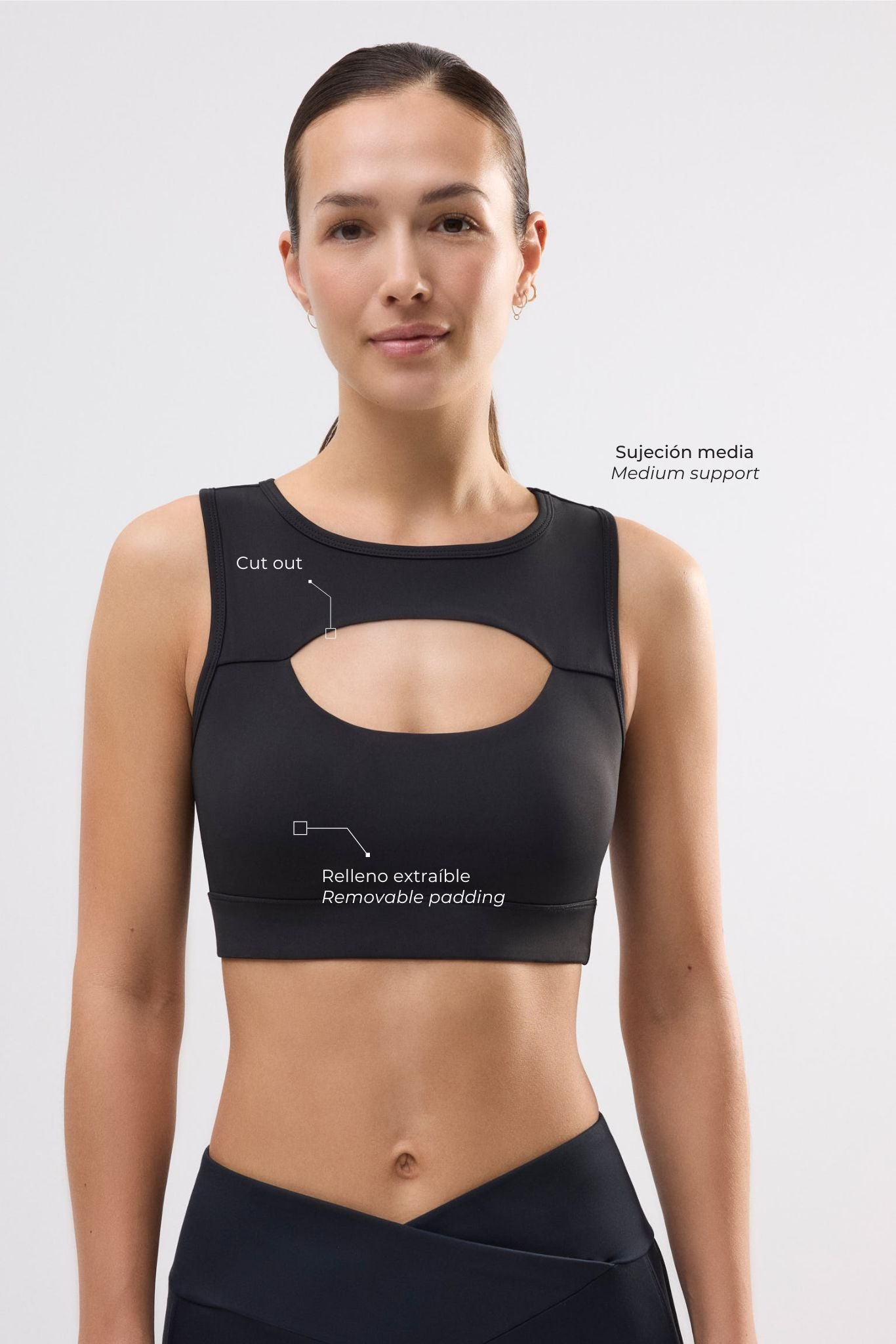 Sujetador deportivo con detalles cut out sujeción media negro - Ysabel Mora