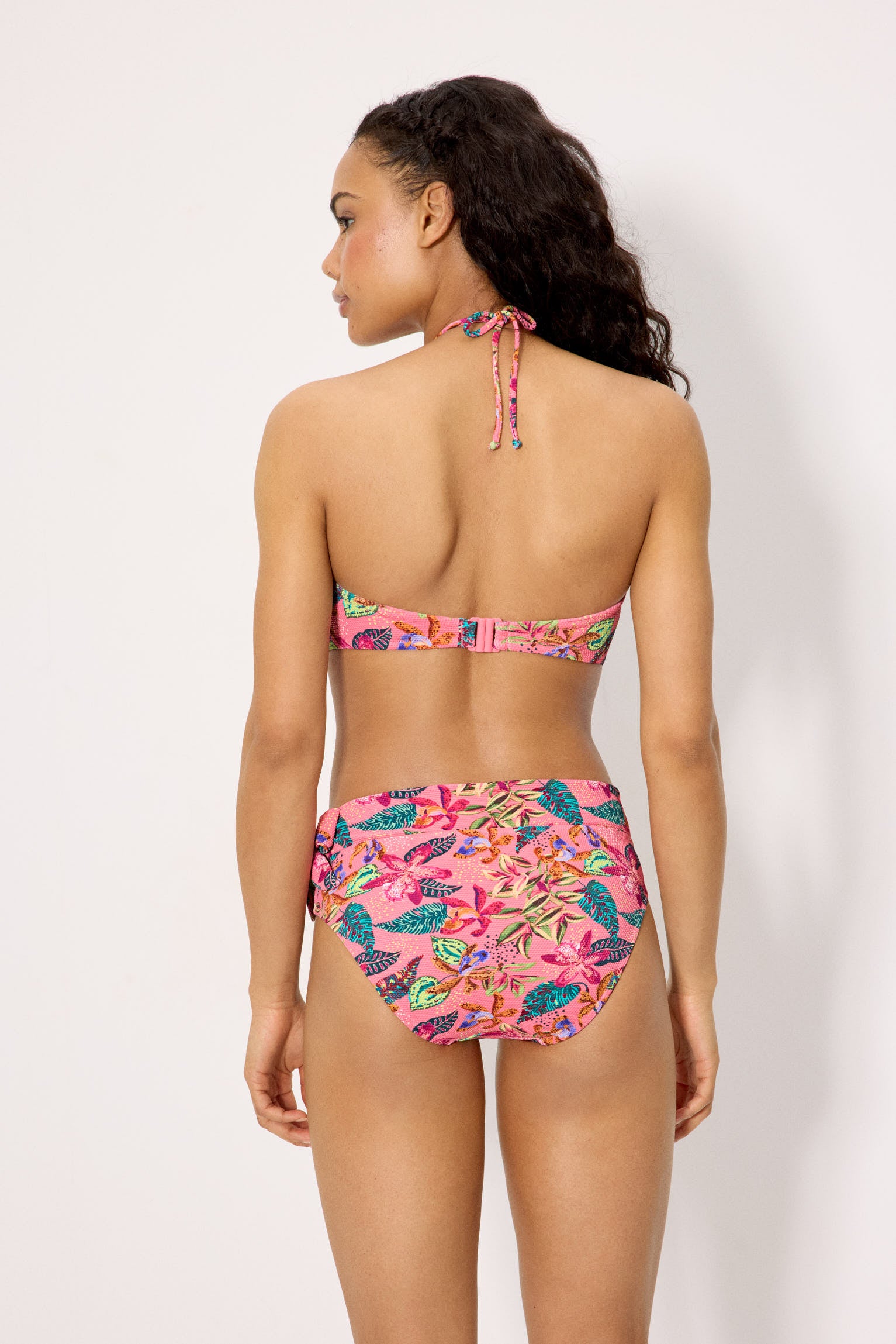 Conjunto de bikini top reductor y braga multiposición piqué estampado tropical copa C