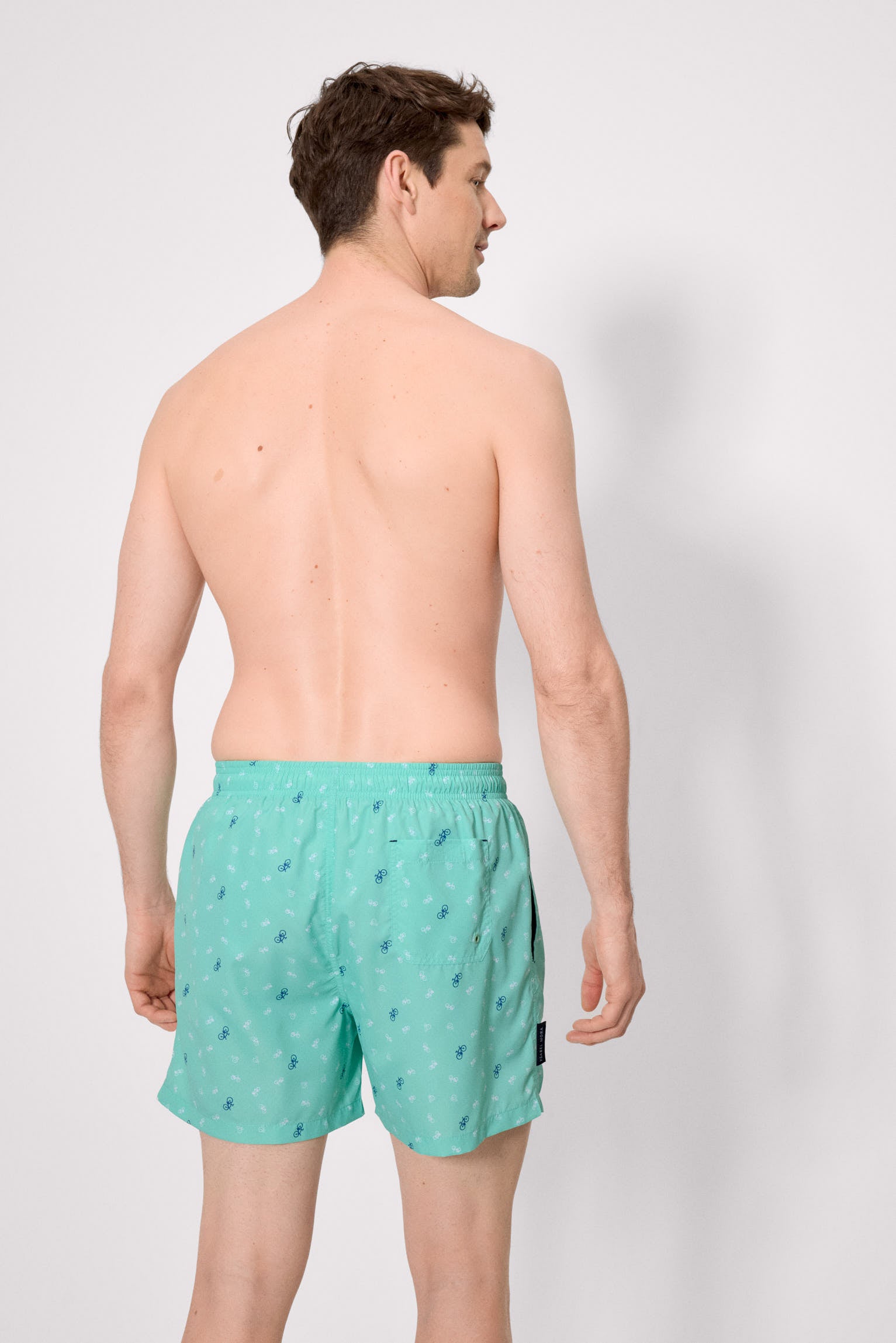 Bañador medio estampado bicicletas verde