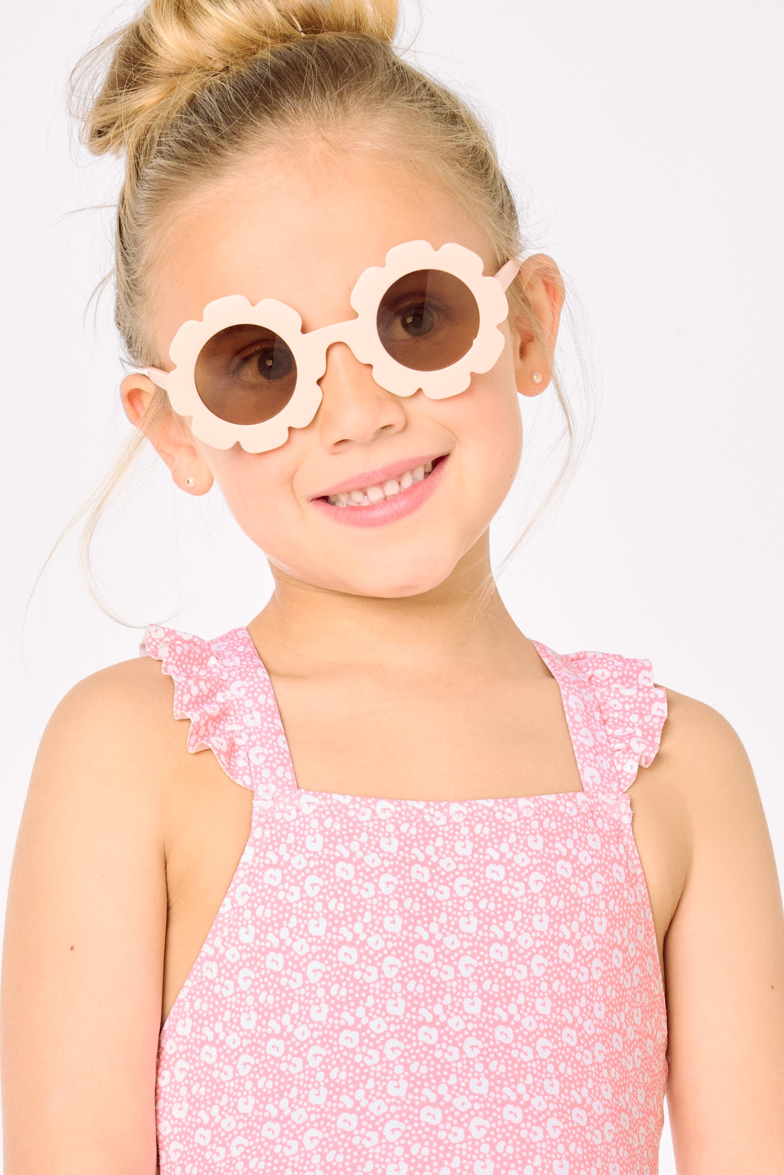 Bañador niña detalles volantes y tirantes cruzados estampado leopardo rosa