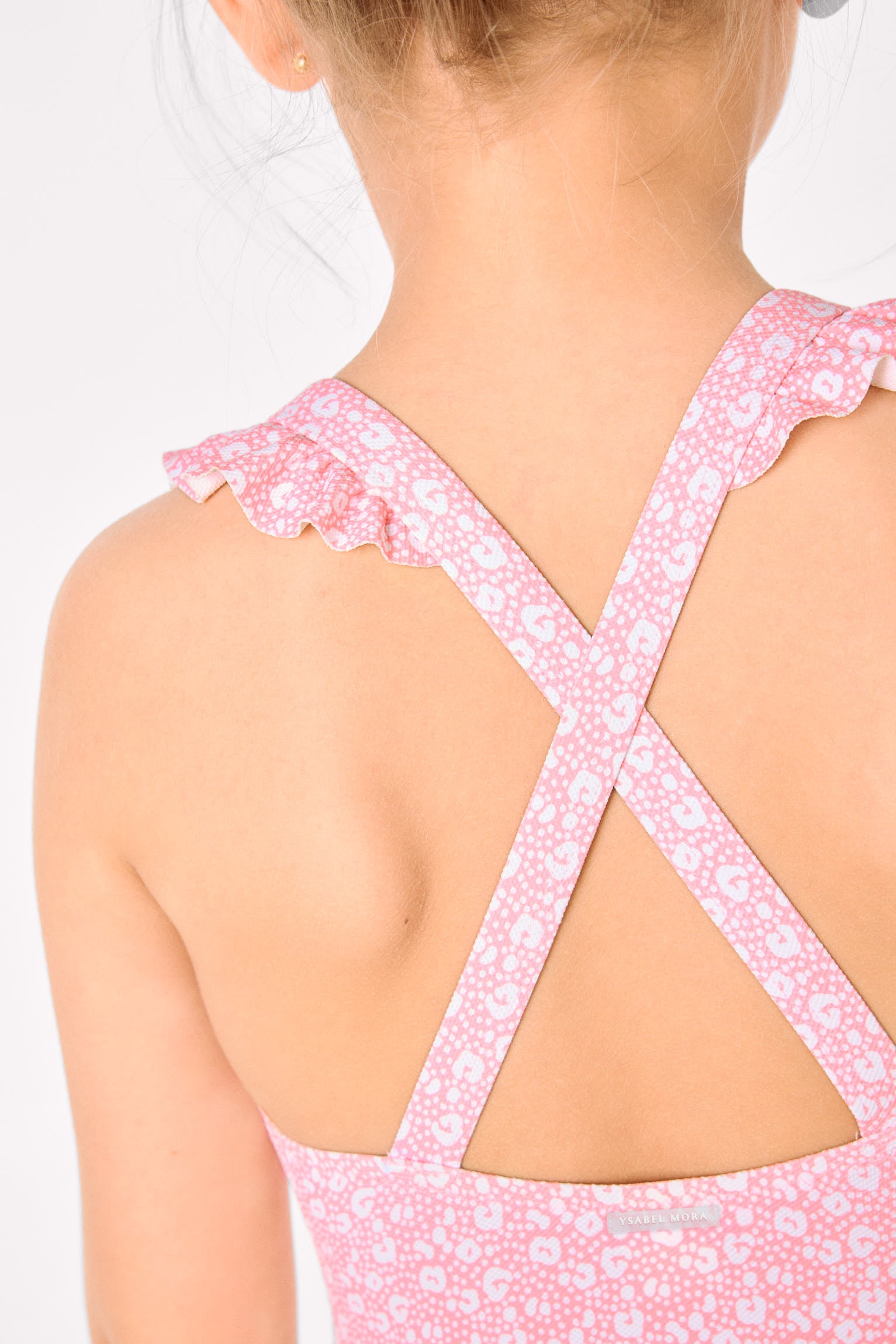 Bañador niña detalles volantes y tirantes cruzados estampado leopardo rosa