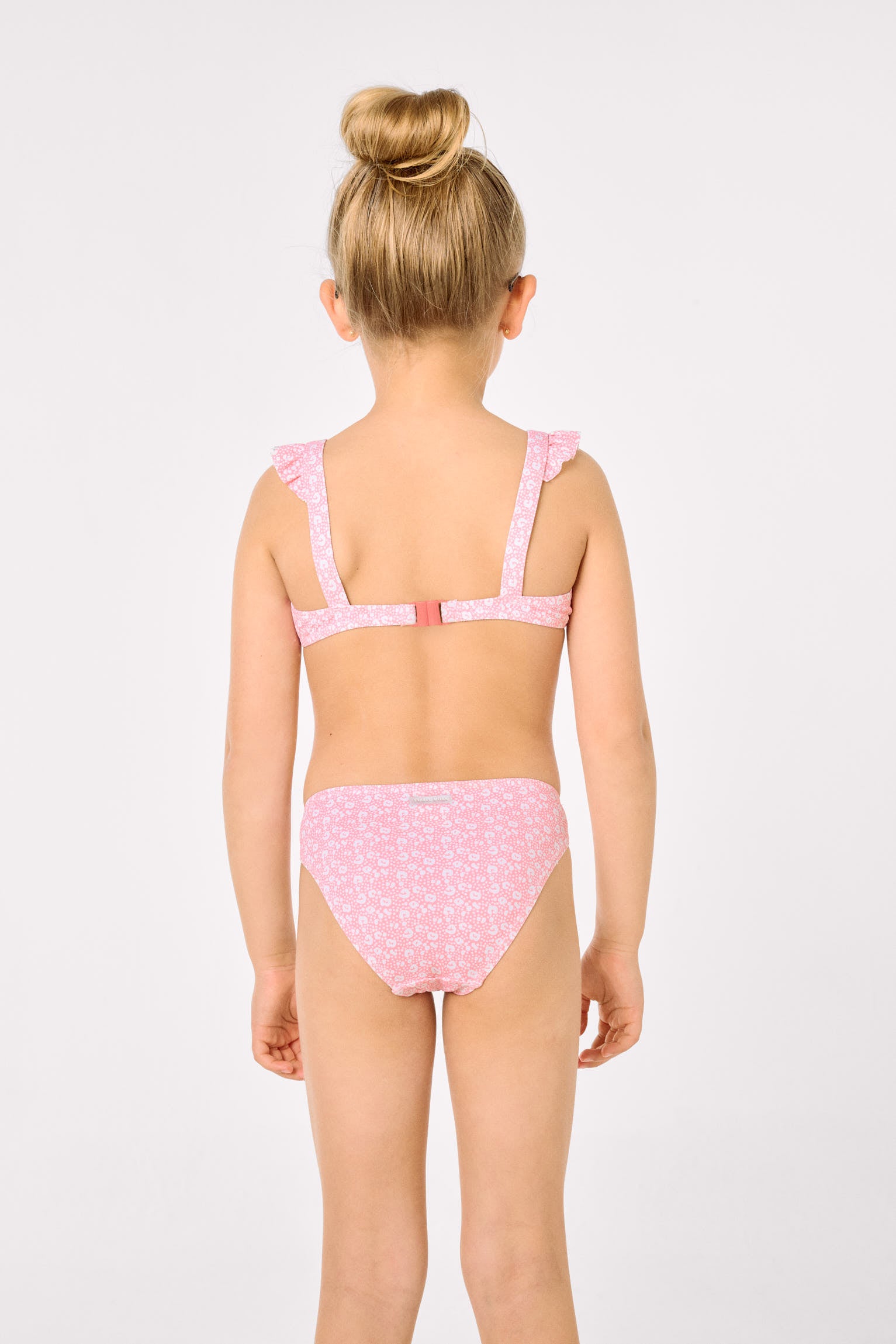 Conjunto bikini niña detalles volantes estampado leopardo rosa