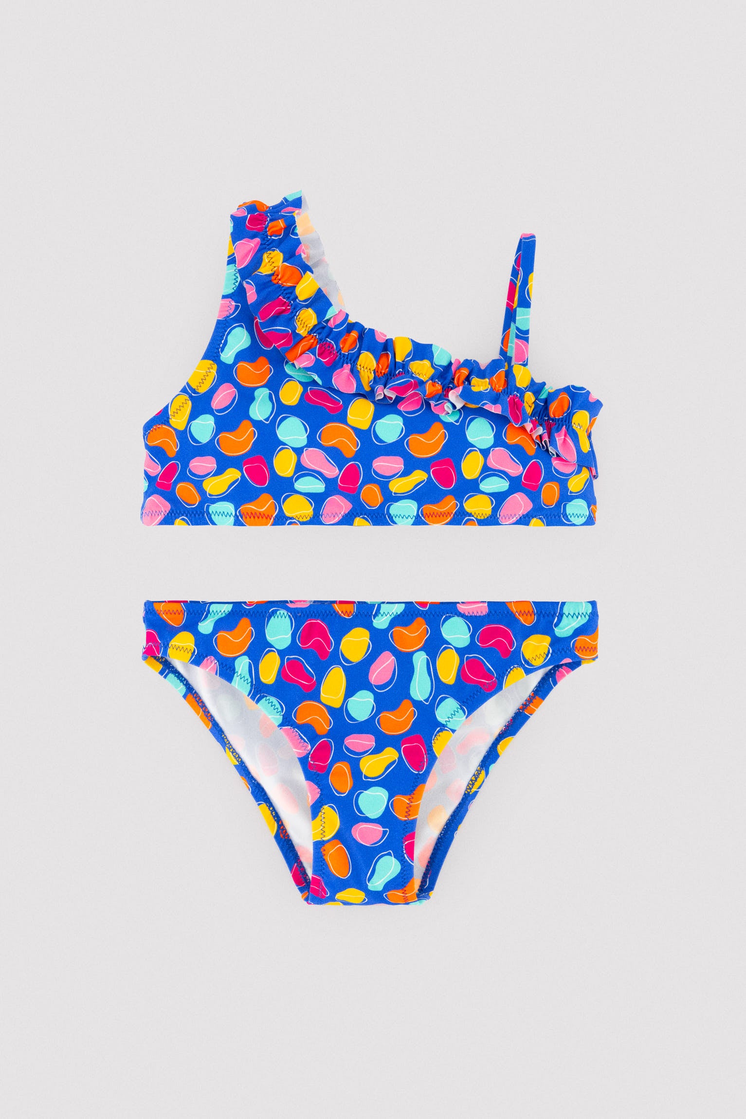 Bikini niña detalle fruncido estampado formas orgánicas multicolor