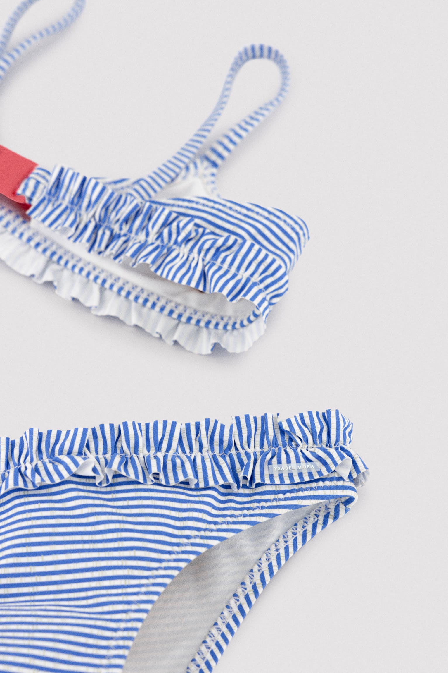 Bikini niña detalle lazo y fruncidos estampado rayas