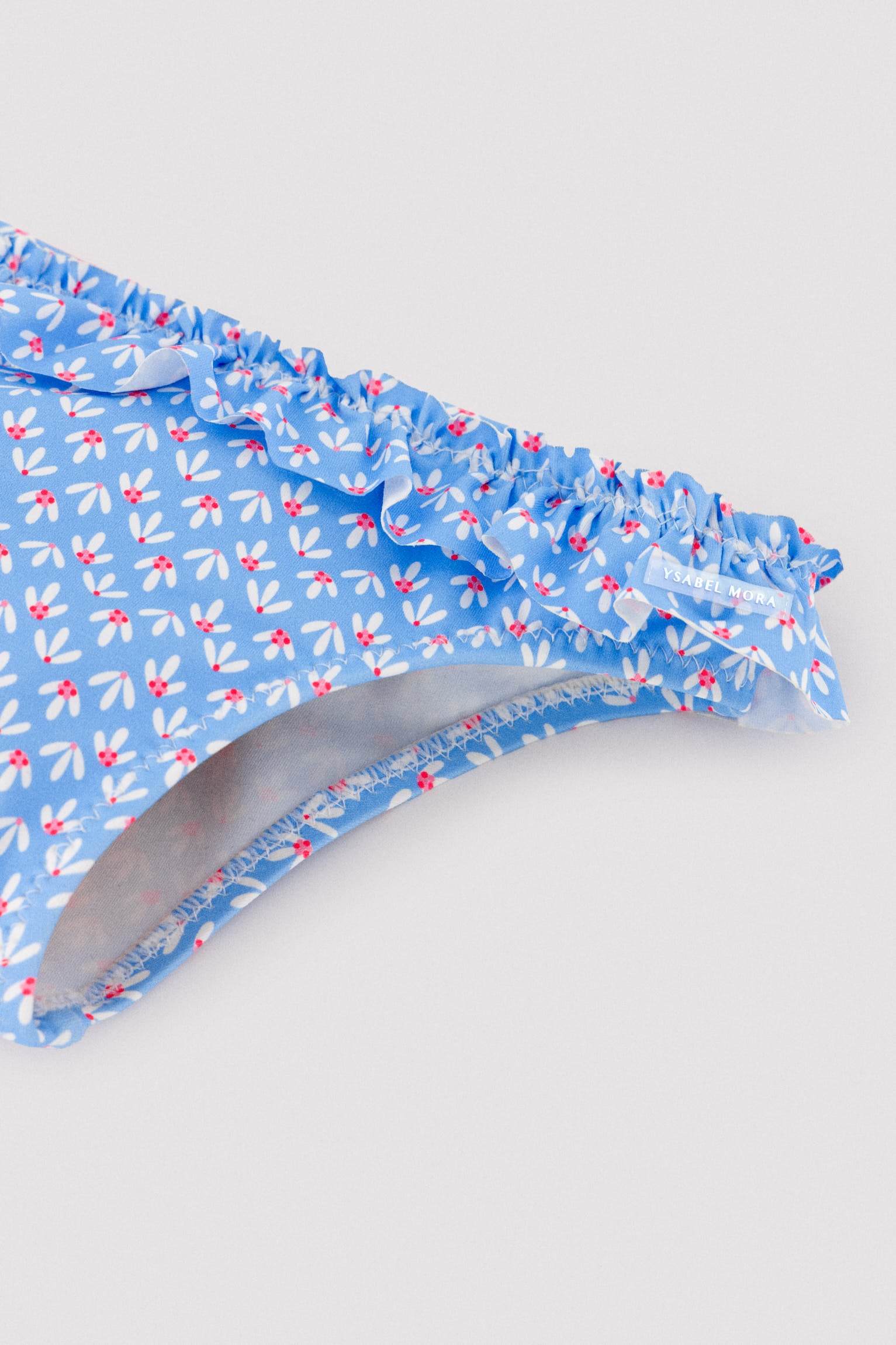 Culetín bebé detalles volantes y lazos estampado flores