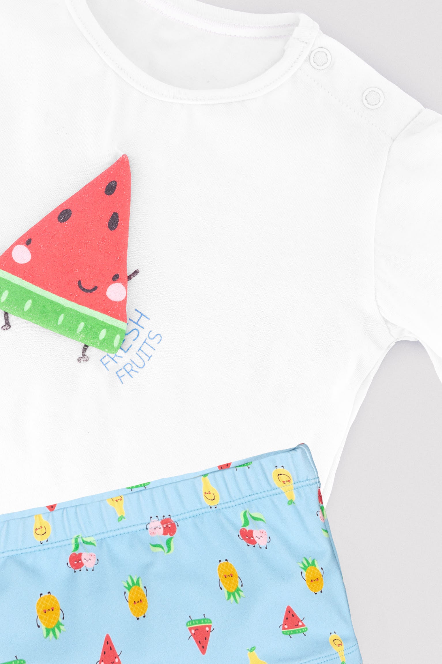 Conjunto camiseta y bañador bóxer bebé esstampado frutas