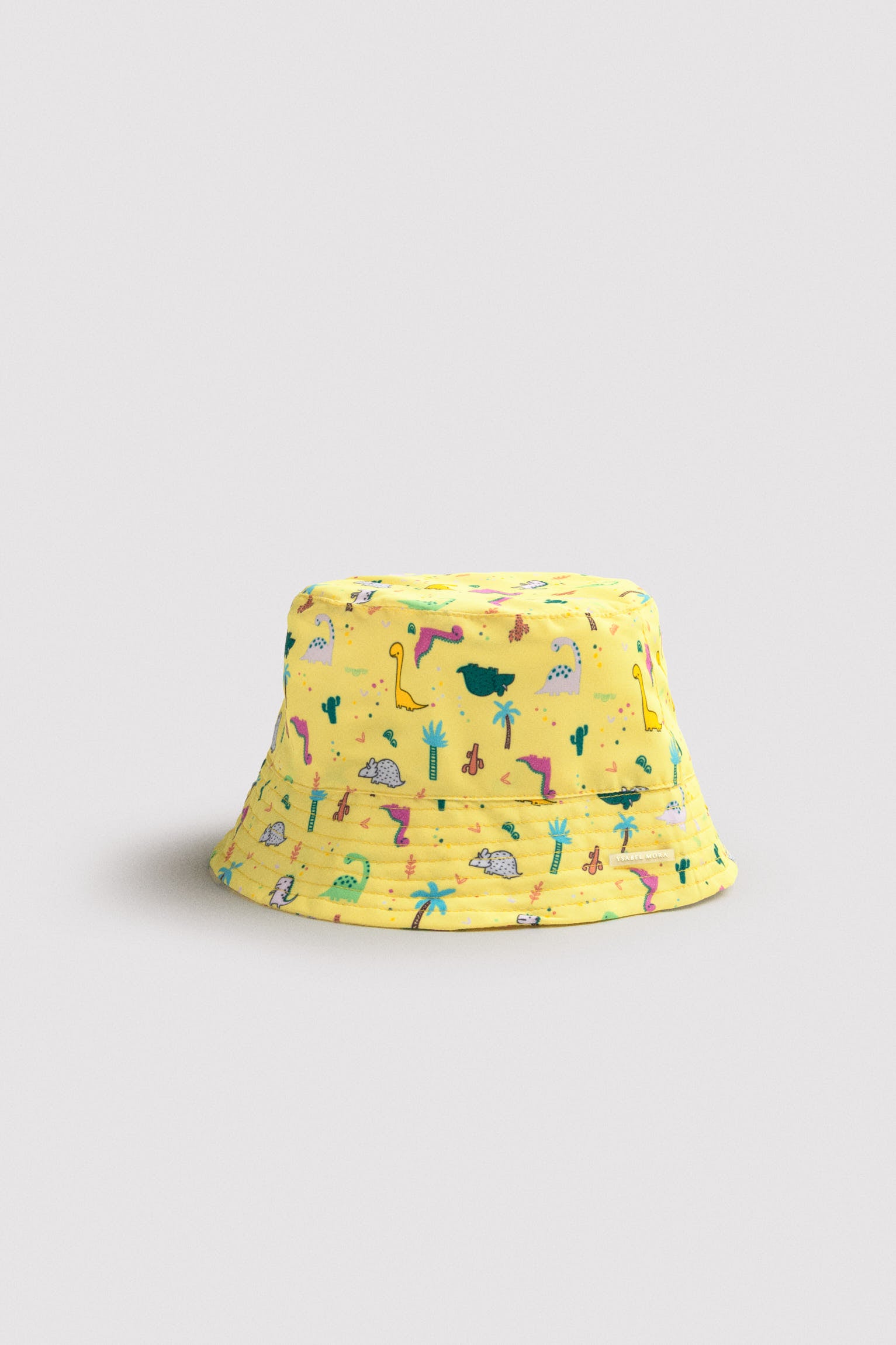 Gorro de playa bebé ala recta estampado dinosaurios - Ysabel Mora