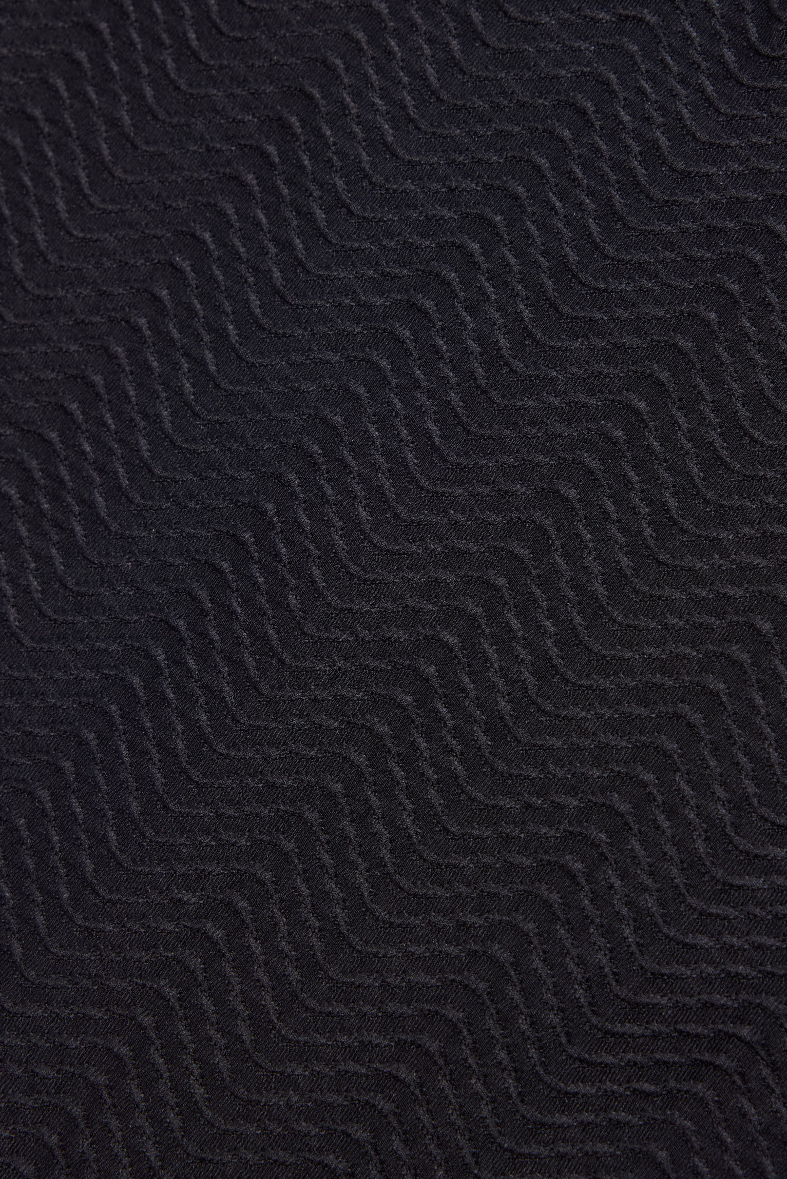 Top bikini juvenil texturizado con lazo y relleno extraíble