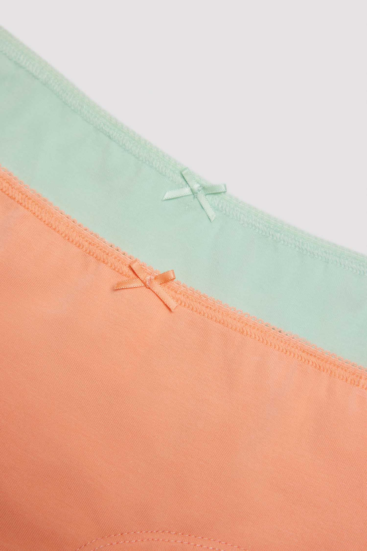 Pack of 2 girl's hipster panties in orange and green colors