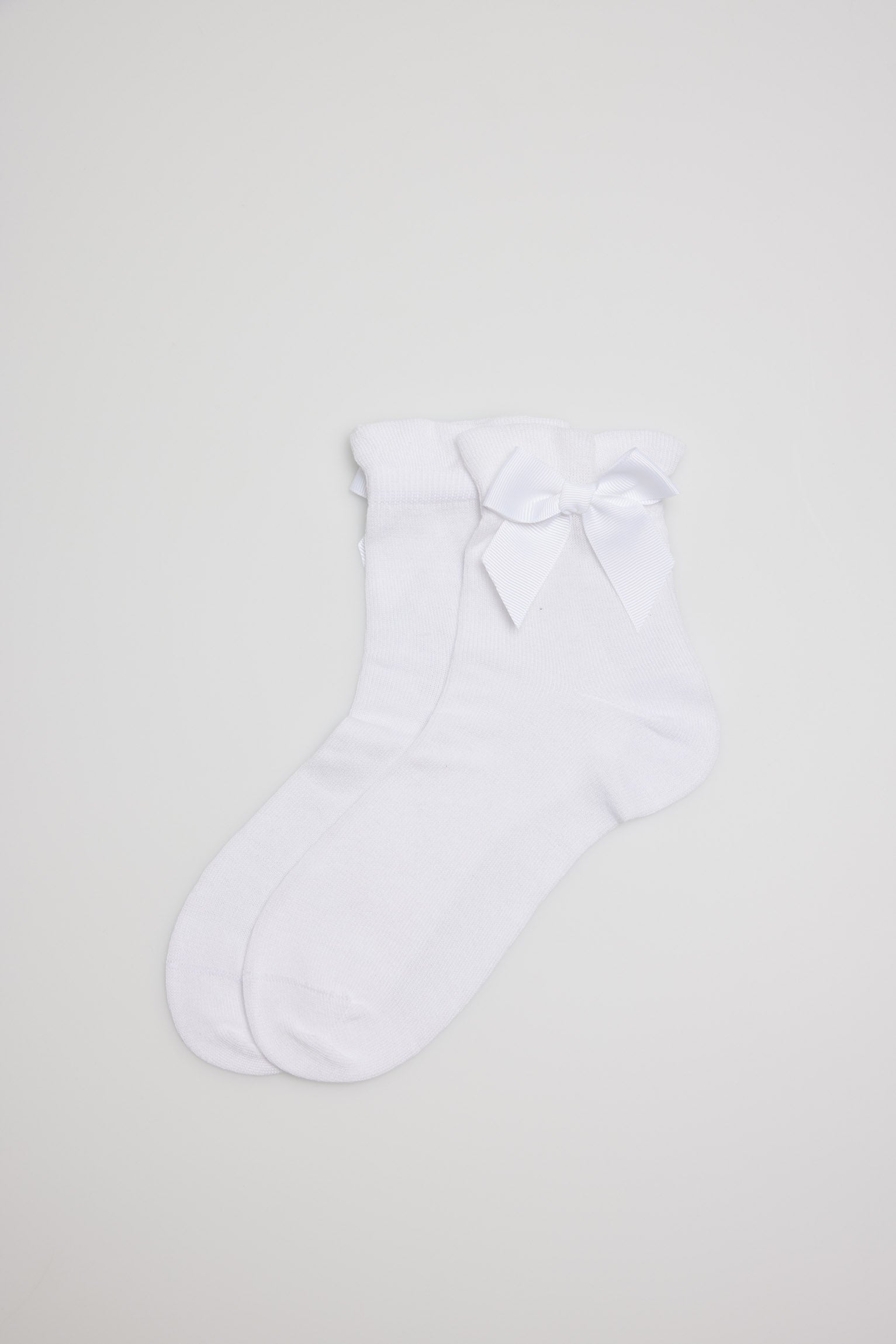 Calcetines infantiles de ceremonia lazada en blanco