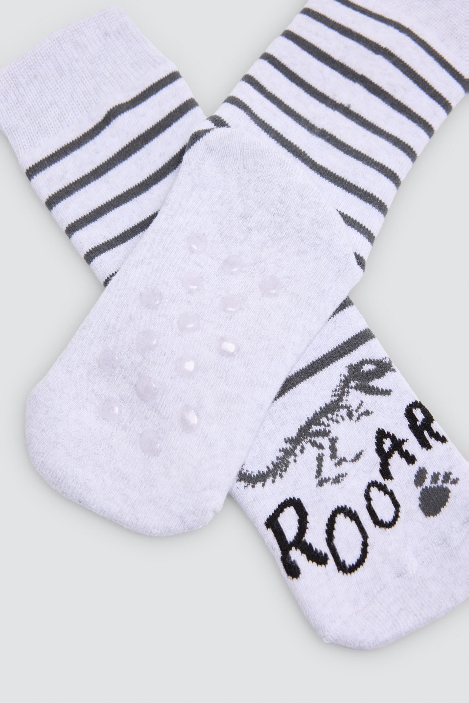 Pack 3 calcetines niño térmicos antideslizantes estampado dinosaurios y huellas