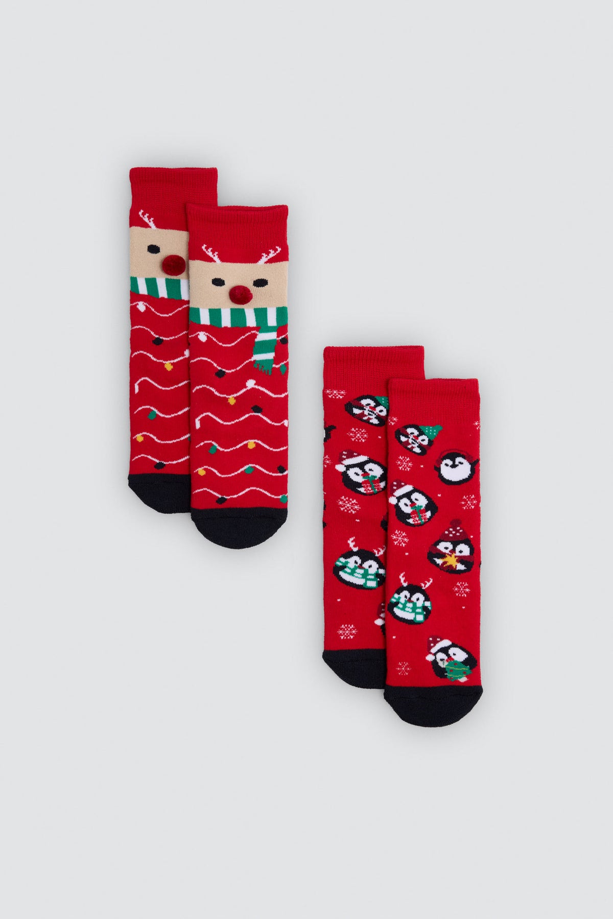 Pack 2 calcetines infantiles algodón navidad estampado renos y pingüinos