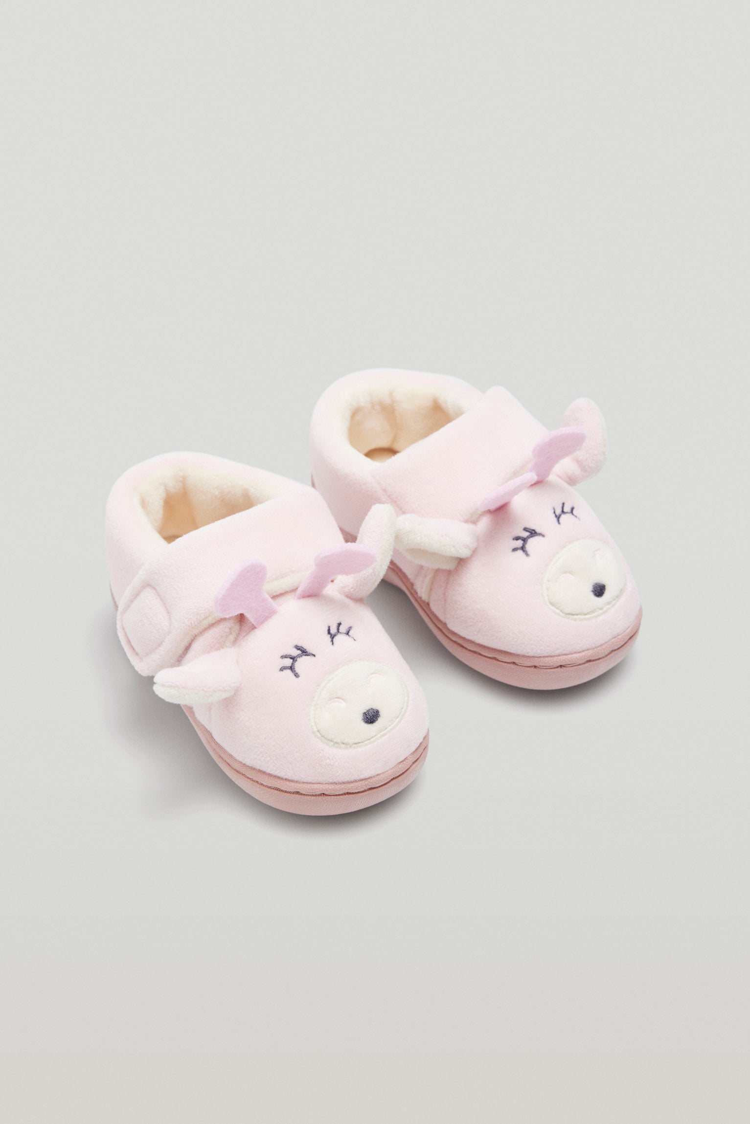 Baby house slippers with pink adhesive closure