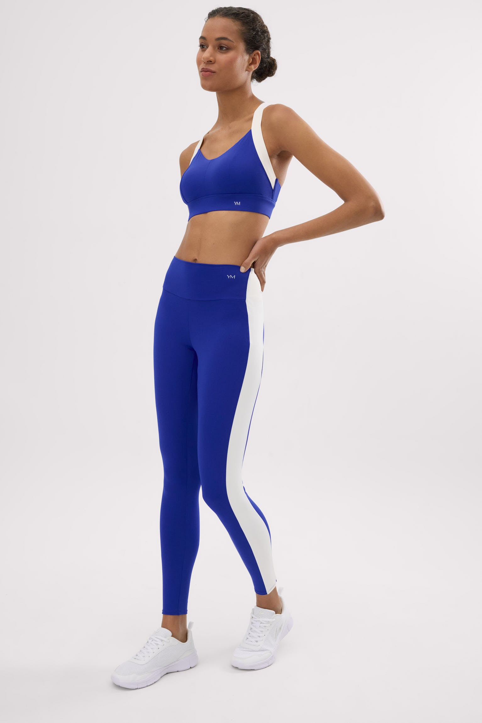 Leggings deportivos largos efecto push-up azul índigo con franja en contraste - Ysabel Mora