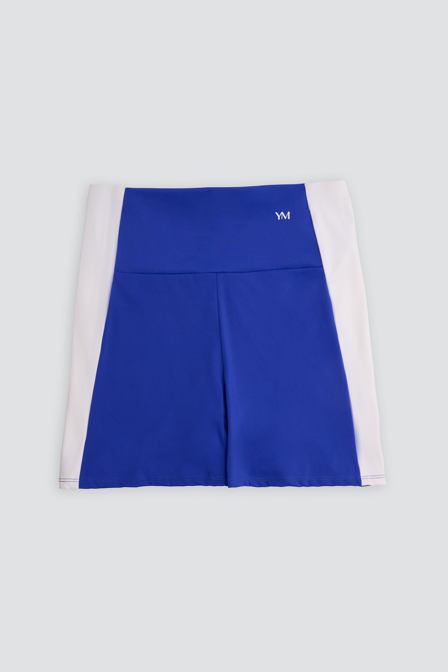 Leggings deportivos cortos efecto push-up azul índigo con franja en contraste - Ysabel Mora