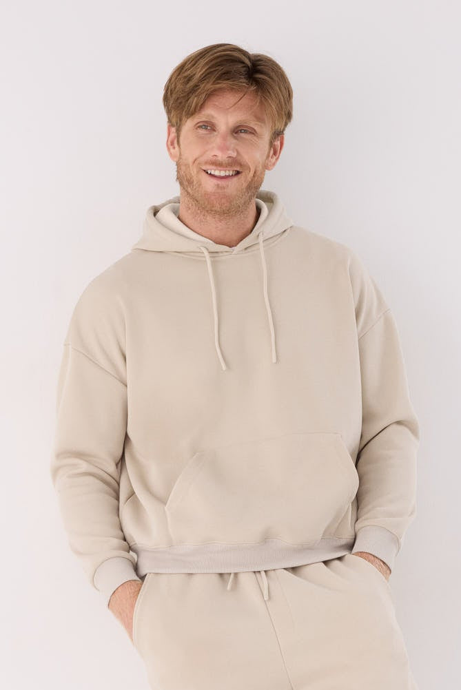 Sudadera deportiva hombre afelpada con capucha beige