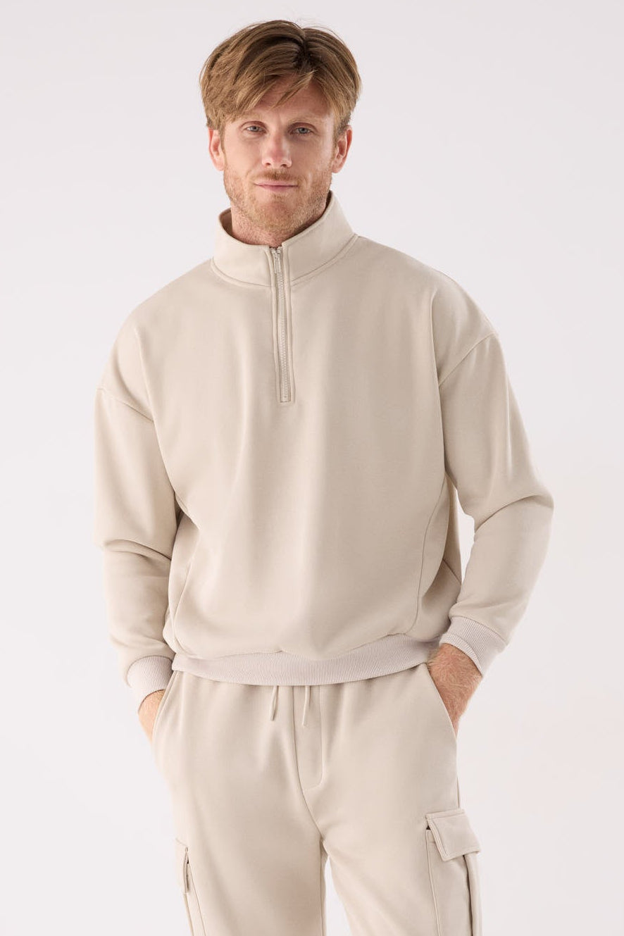 PREVENTA Sudadera deportiva hombre afelpada semi cremallera beige