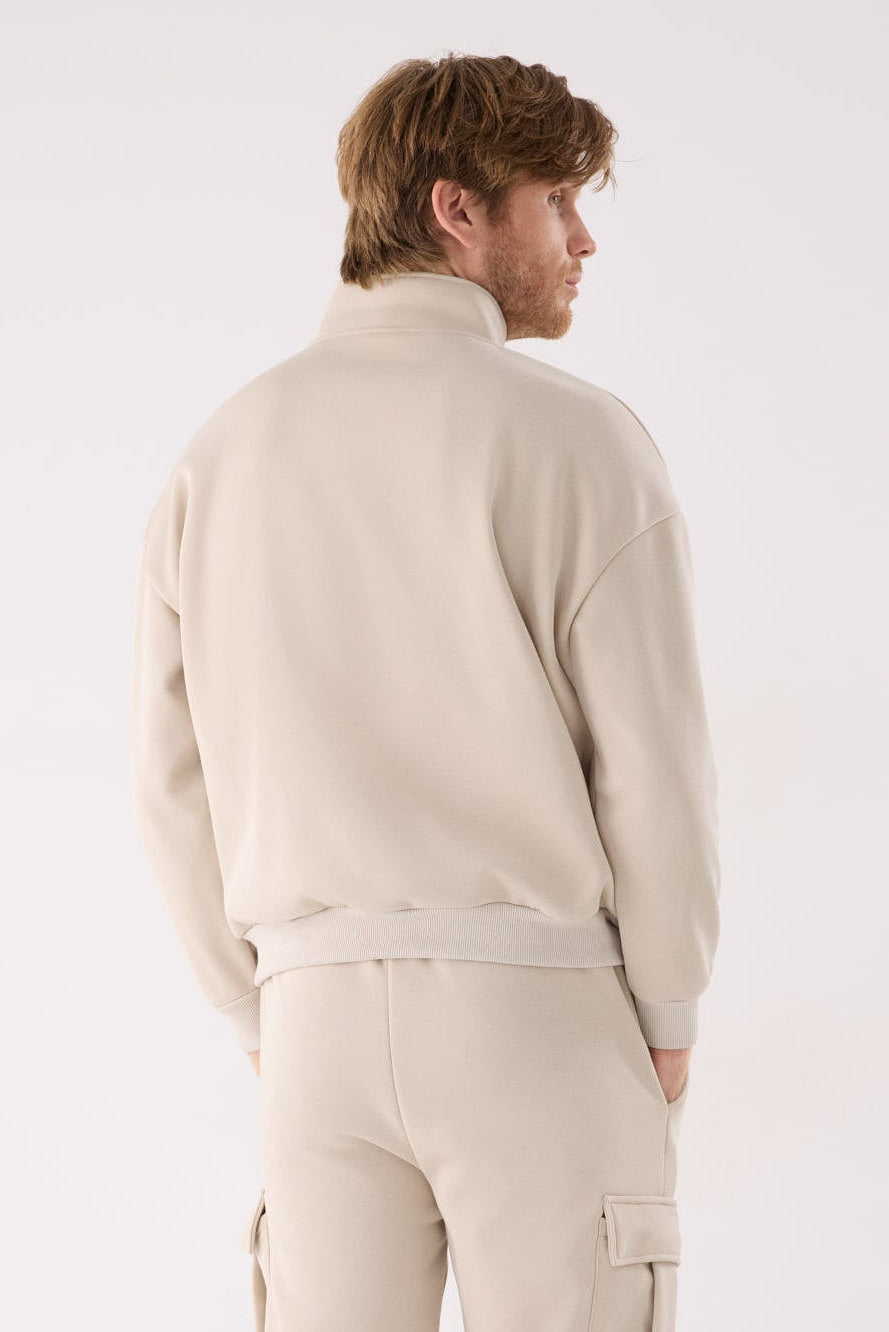 PREVENTA Sudadera deportiva hombre afelpada semi cremallera beige
