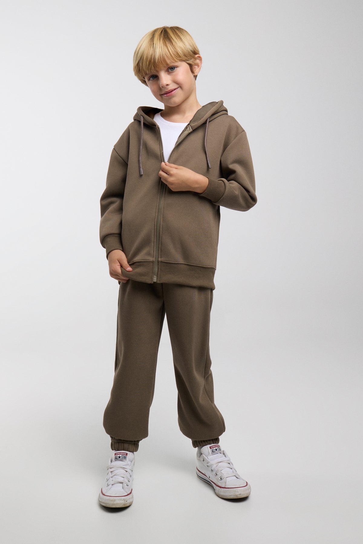 Chándal deportivo de niño afelpado con chaqueta con capucha y cremallera y pantalón jogger ancho en color verde botella