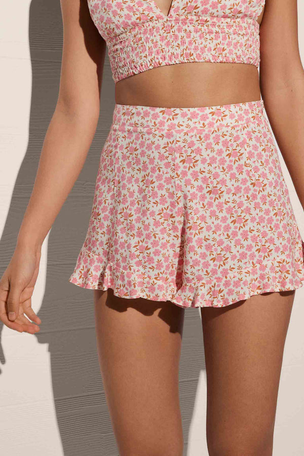 Pantalones cortos de estampado floral con volantes rosa