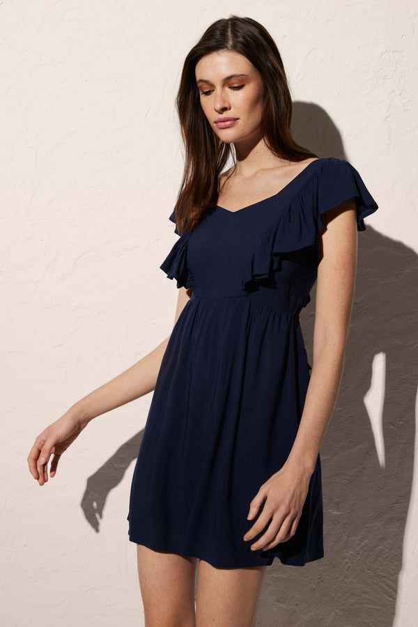 Short beach dress with bow detail on the back in navy