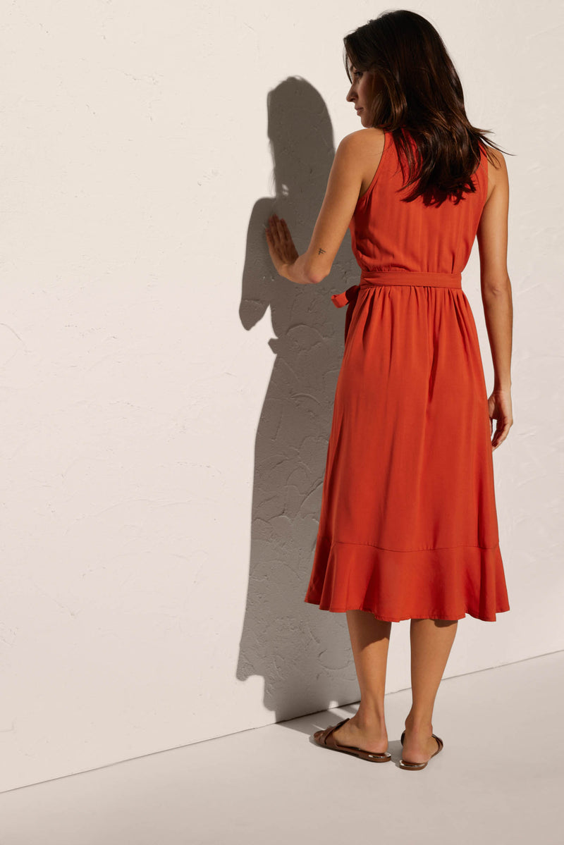 Knee-length beach dress with bow detail and orange ruffles