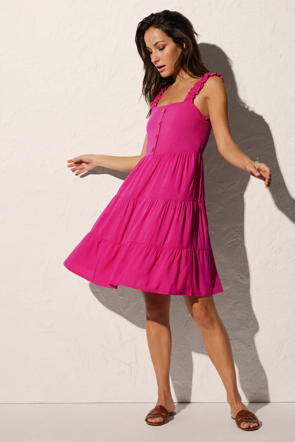 Short beach dress with gathered straps and fuchsia buttons