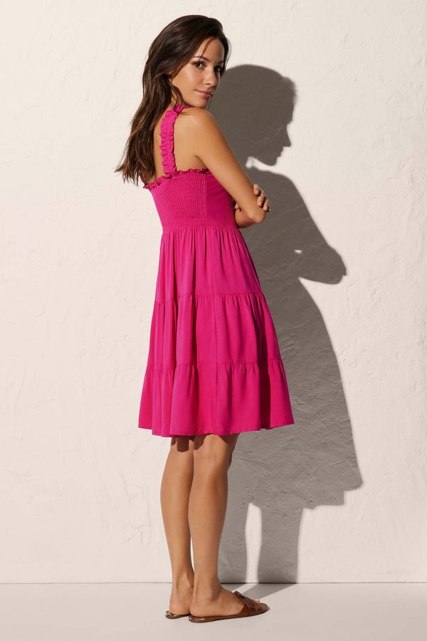 Short beach dress with gathered straps and fuchsia buttons