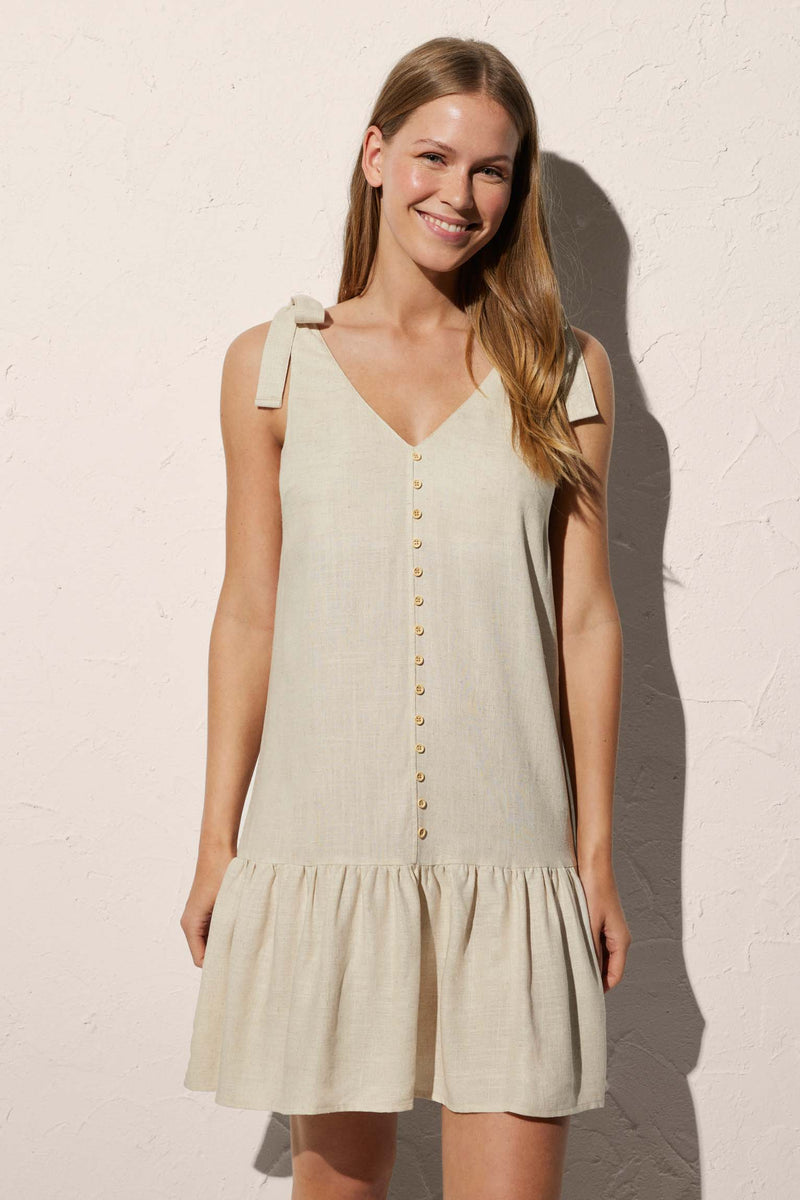 Short beach dress with linen straps and button detail