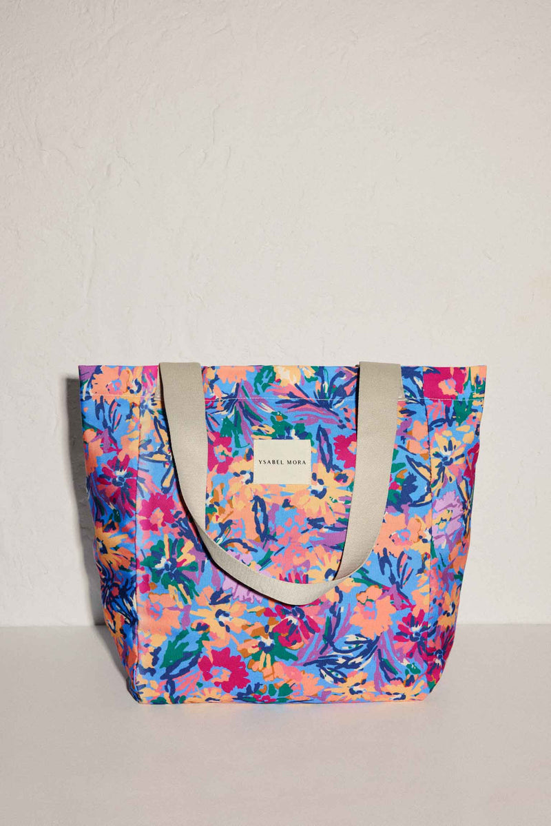 Beach bag with floral print and magnetic closure