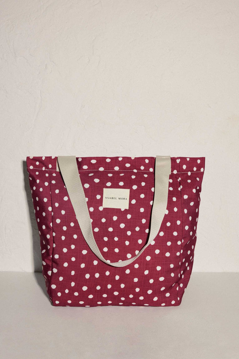 Beach bag with dot print and maroon interior pocket