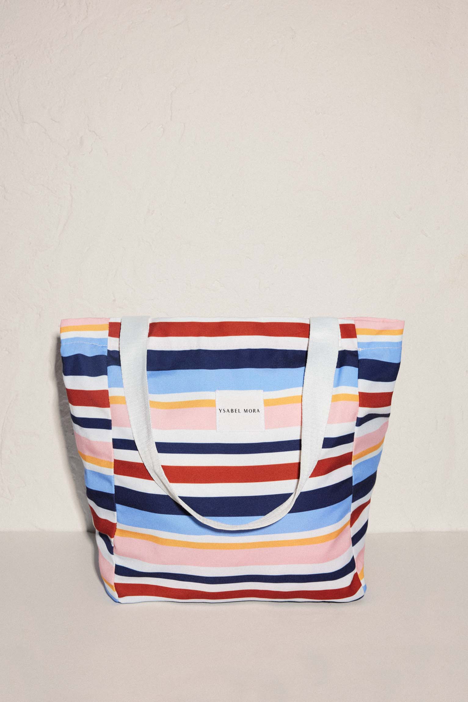 Beach bag with striped print and removable toiletry bag