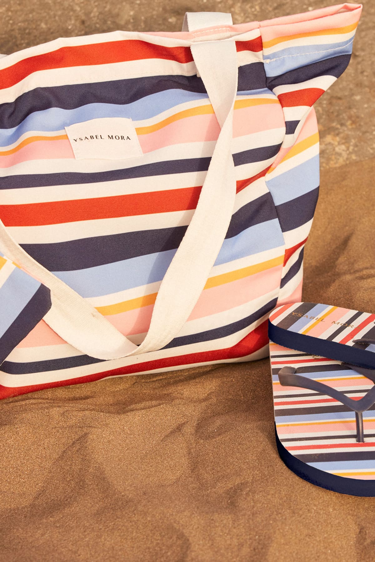 Beach bag with striped print and removable toiletry bag