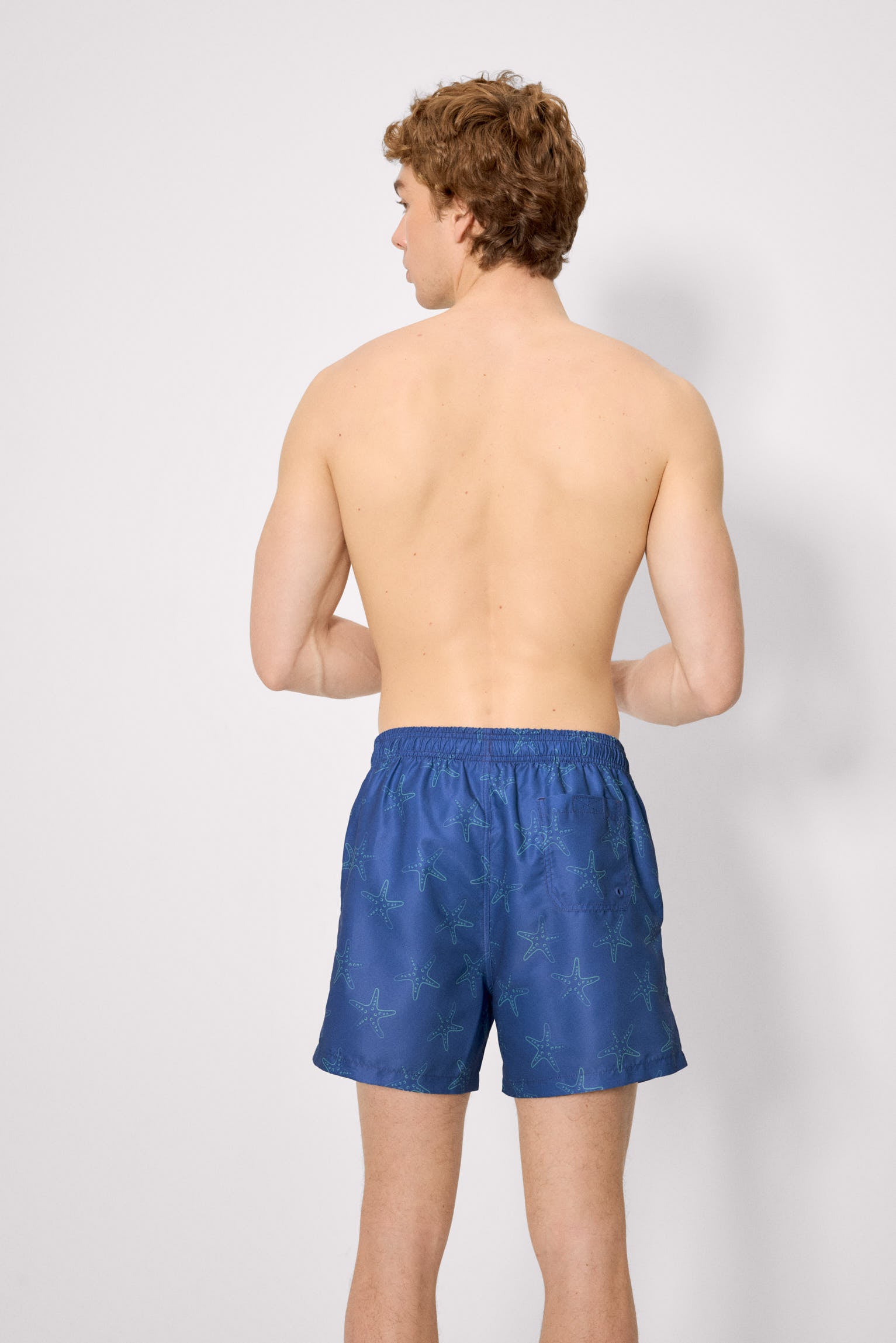 Bañador medio estampado estrellas mar azul