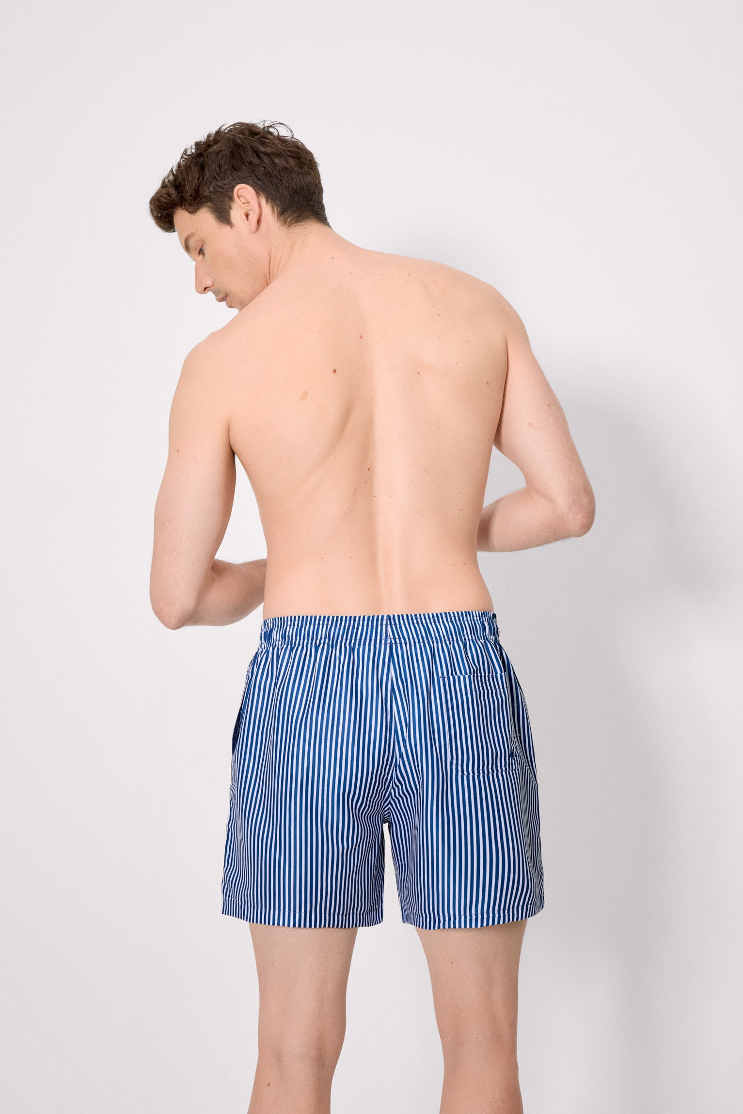 Bañador medio estampado rayas azul