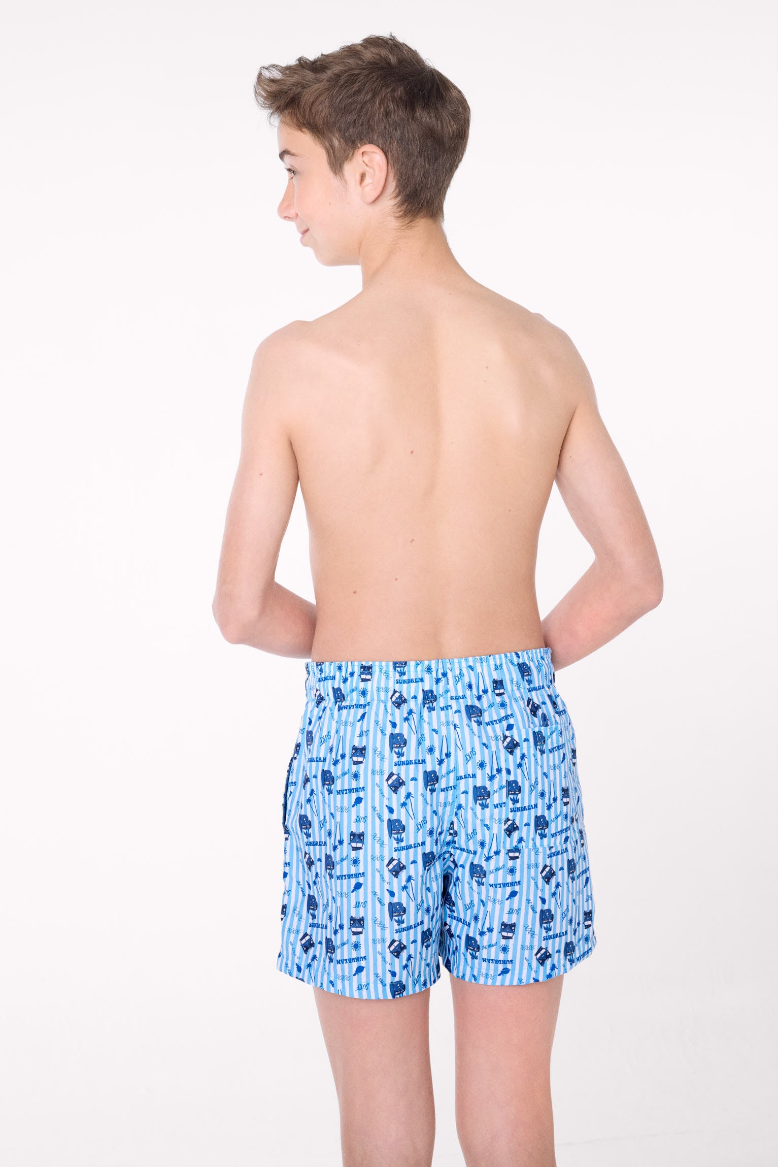 Bañador juvenil corto estampado rayas y motivos veraniegos azul - Ysabel Mora