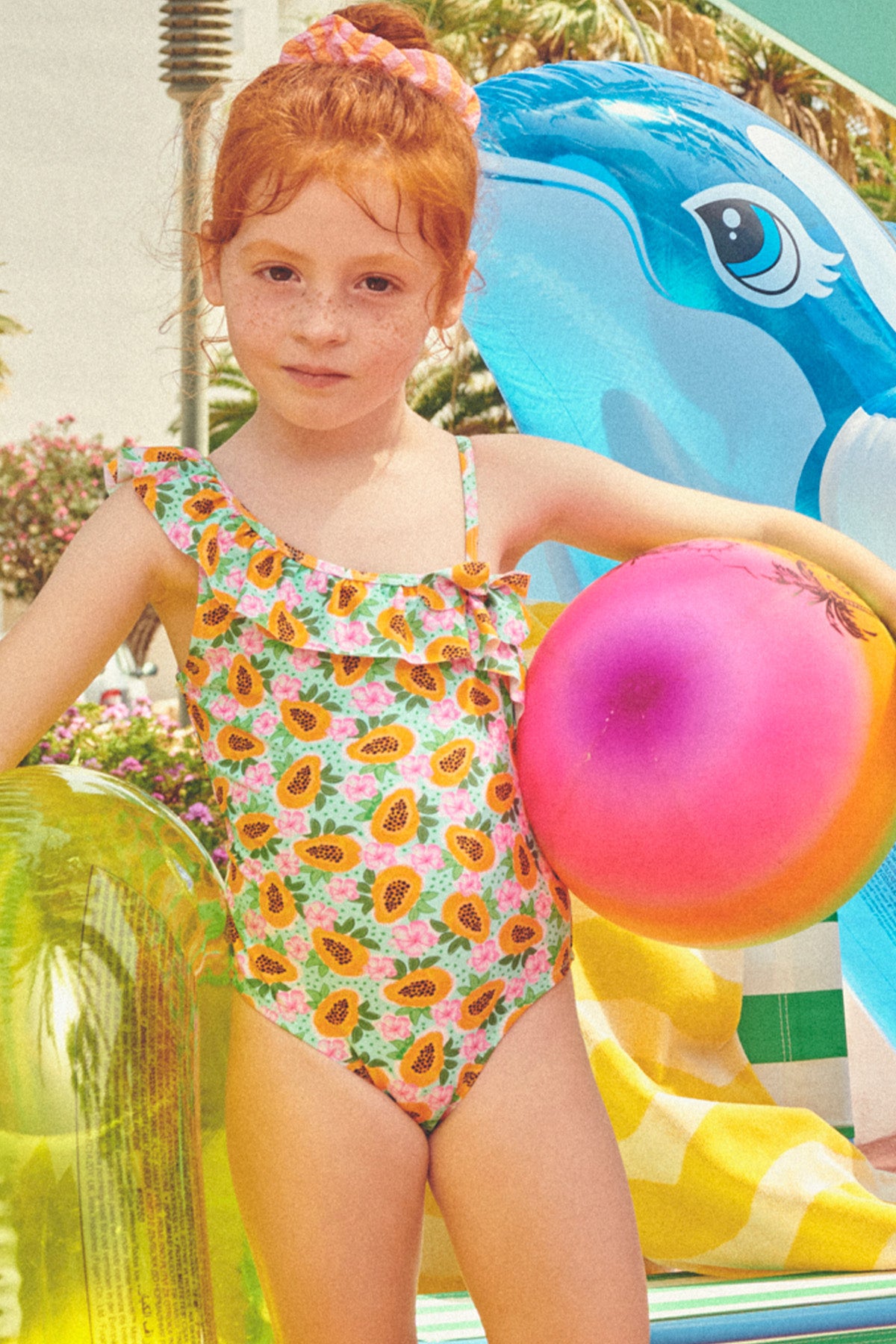Bañador niña detalle lazo estampado papayas