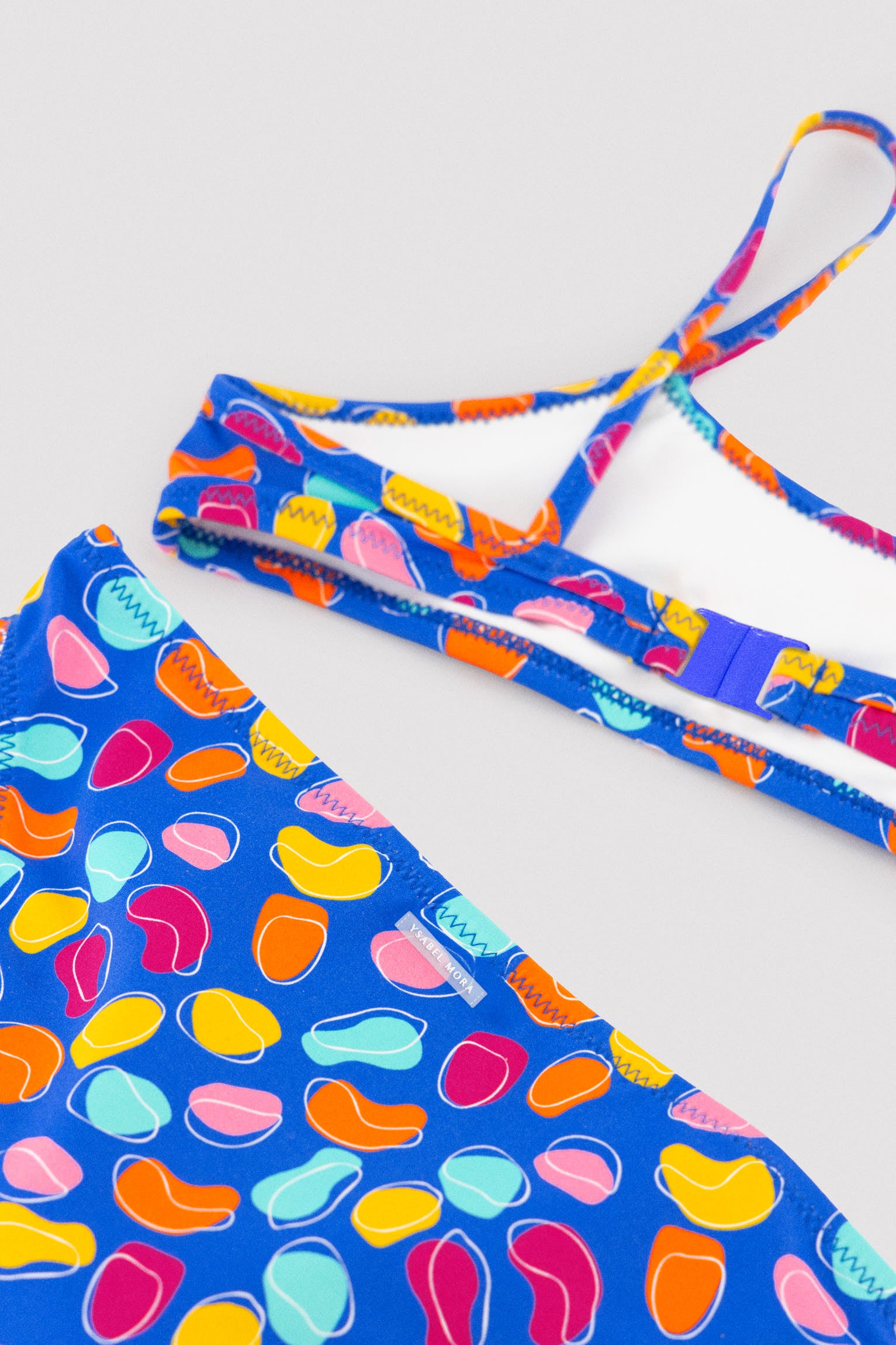 Bikini niña detalle volante estampado formas orgánicas multicolor