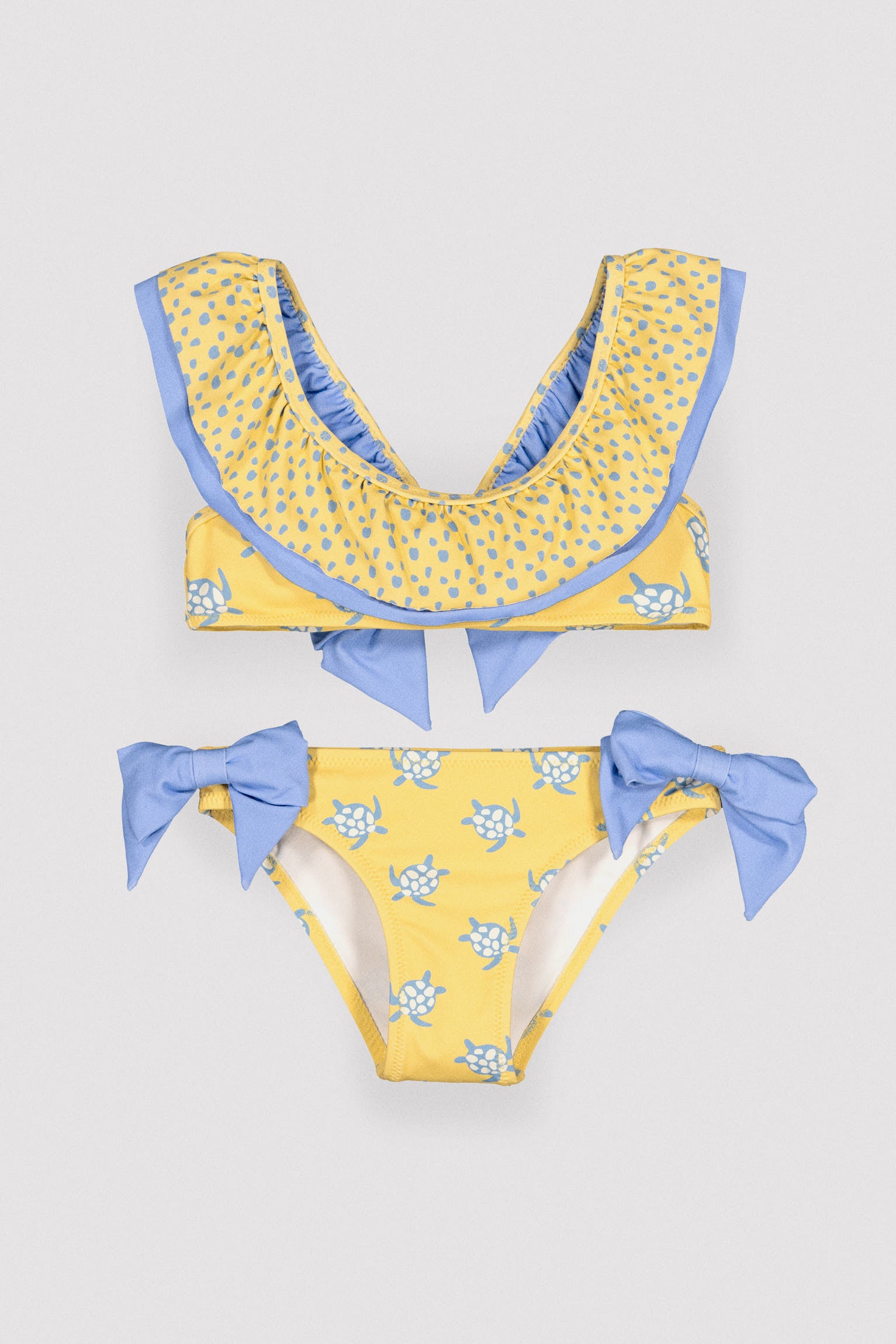 Bikini niña detalle volante y lazos estampado tortugas - Ysabel Mora