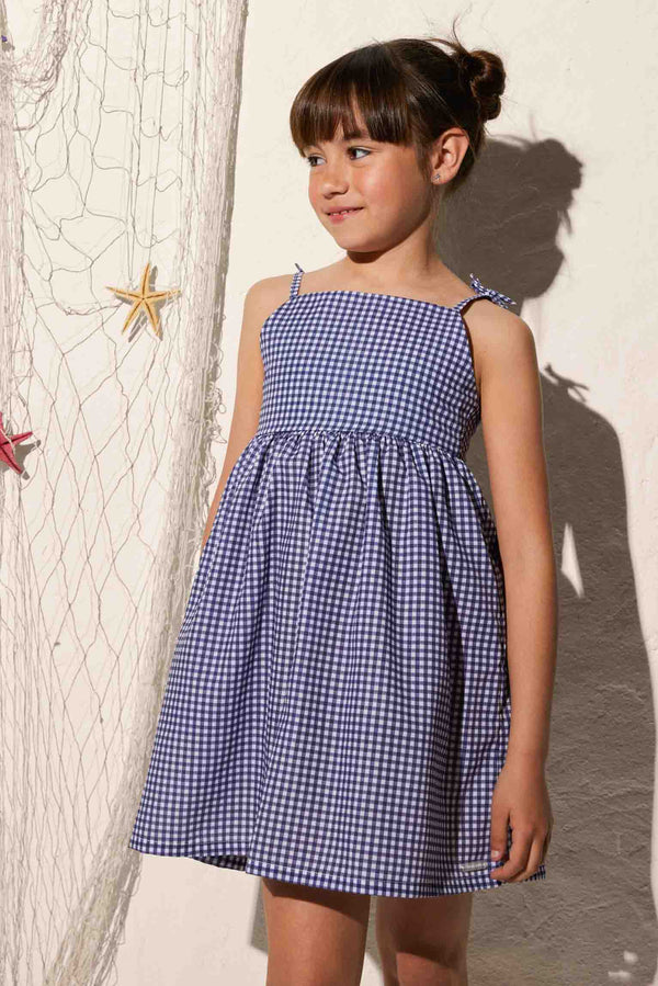Girl's beach dress with knotted straps and striped print