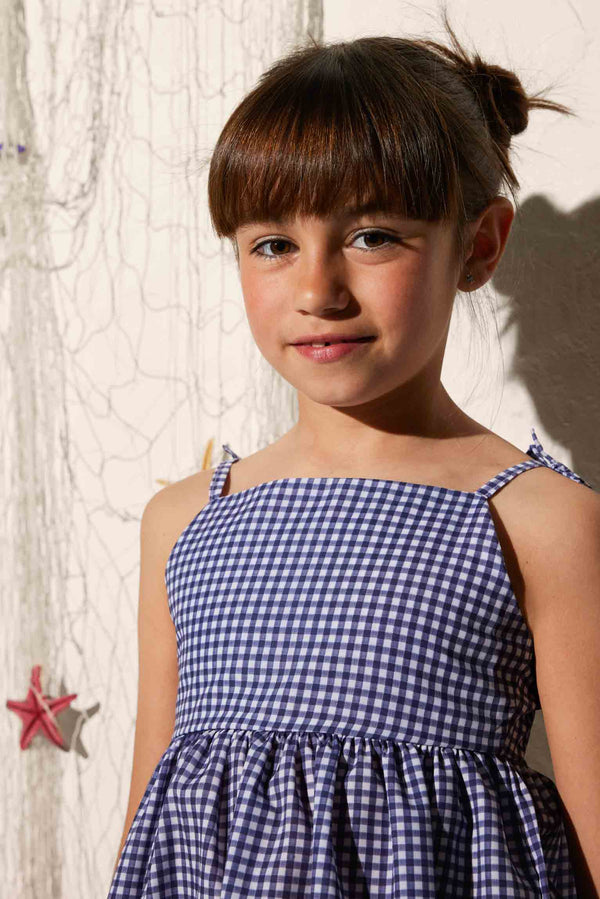 Girl's beach dress with knotted straps and striped print