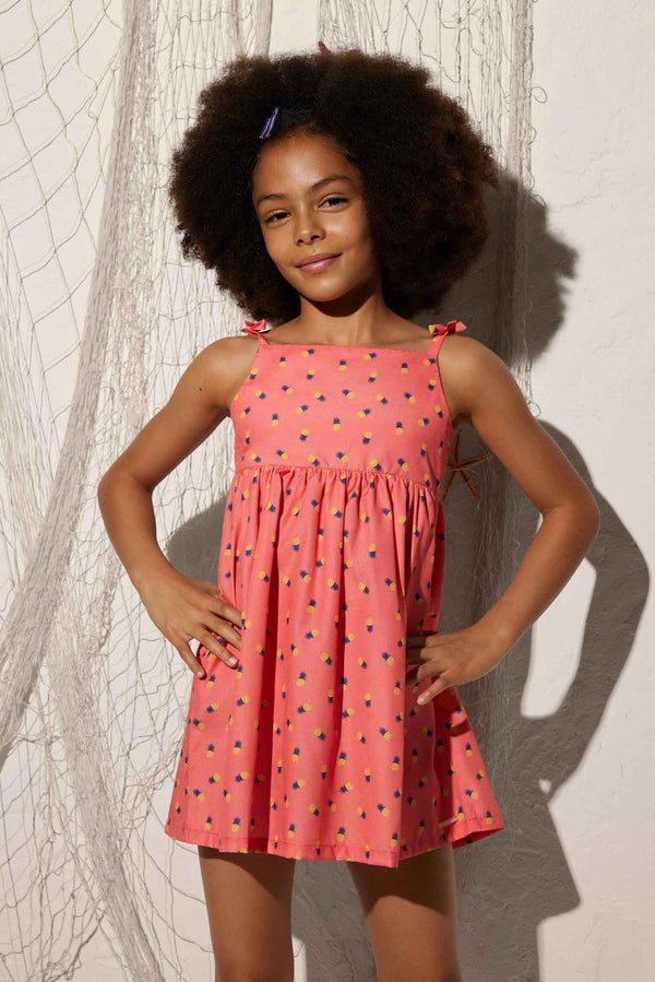 Girl's beach dress with knotted straps and pineapple print
