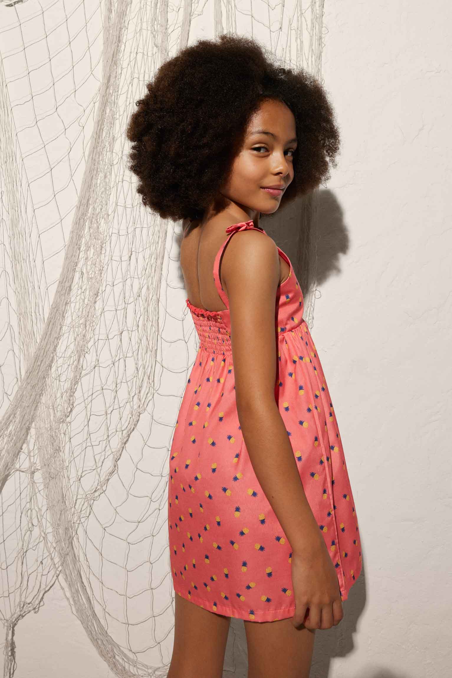 Girl's beach dress with knotted straps and pineapple print