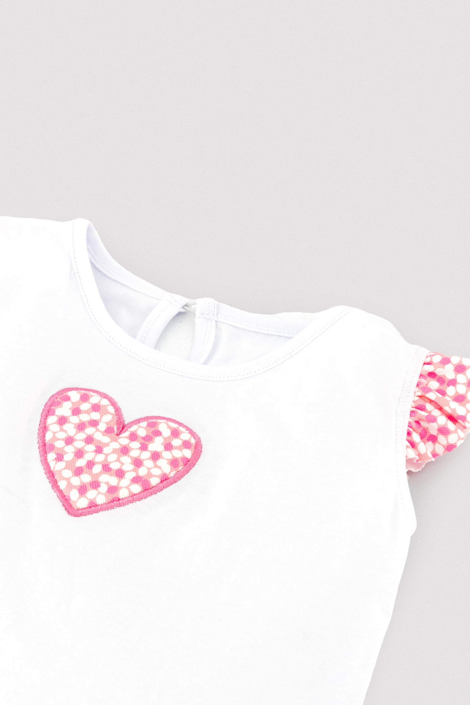 Conjunto bebé camiseta dibujo corazón y braguita estampada