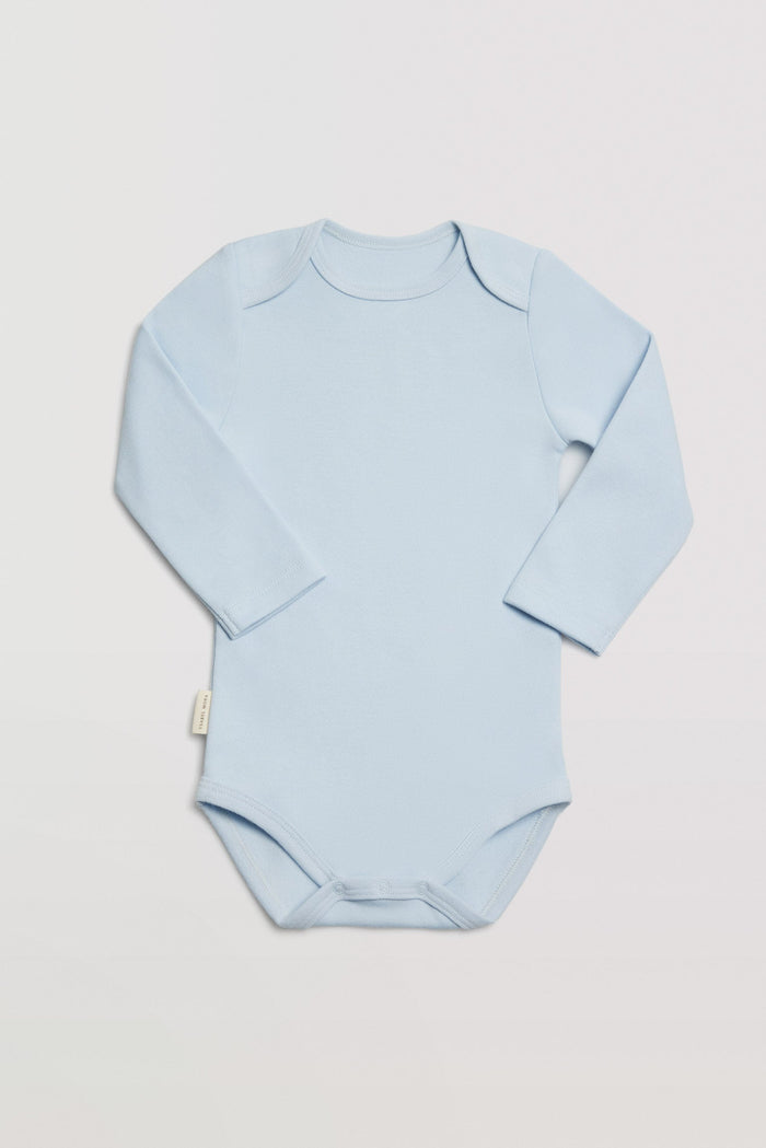 Body bebé básico manga larga solapas celeste