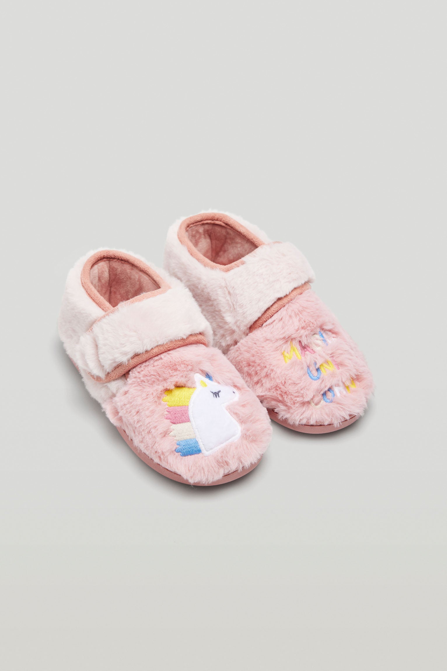 Children's slippers with adhesive closure