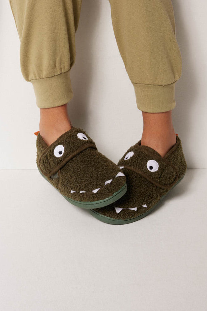 Children's slippers with adhesive closure